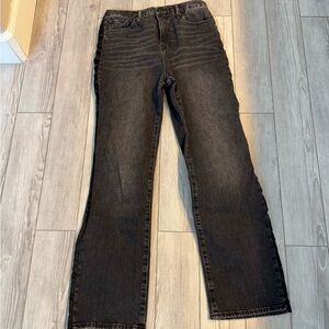 Good American black jeans with a velvet strip down the side of the leg. Size 30